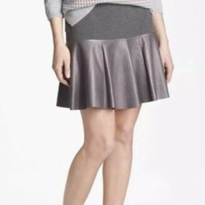 Hinge leather mini skirt